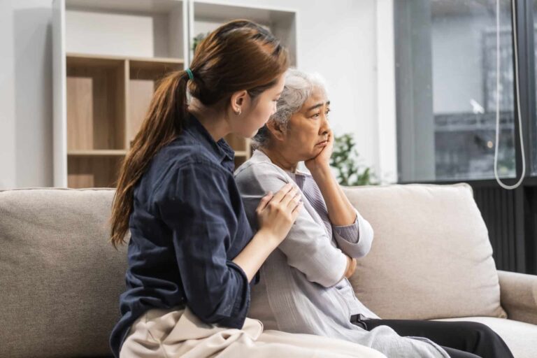 Worried elderly and daughter